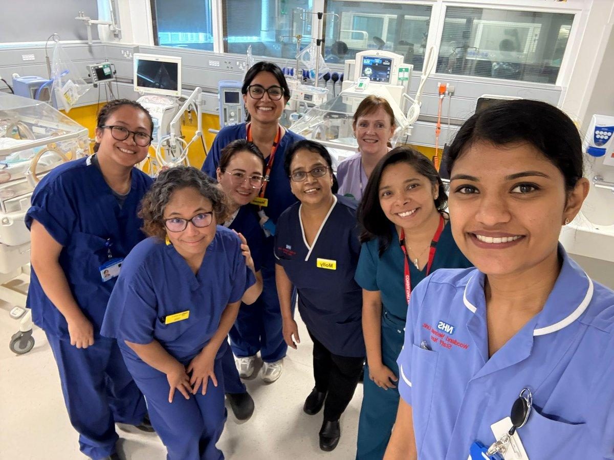 A neonatal unit team gathered together on the ward